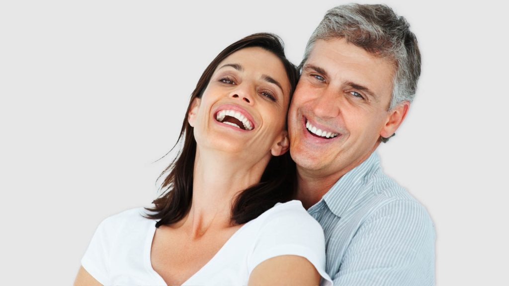Mature couple smiling and holding each other | Adult Wellness | Shahla Medical Group