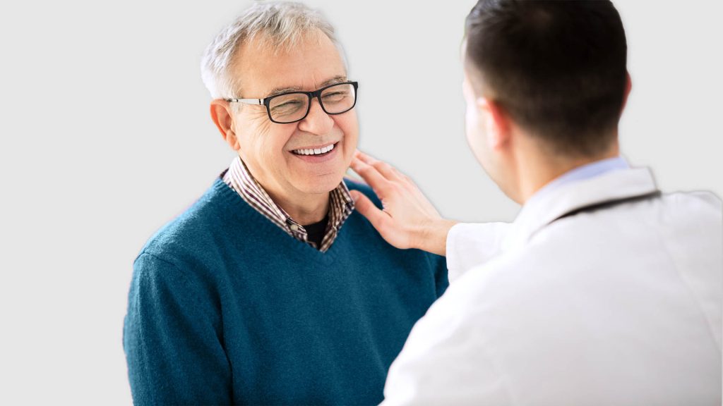 Mature man talking with doctor | Acute Conditions diagnosis & treatment | Shahla Medical Group